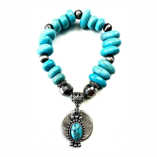 Turquoise and Silver Stretch Charm Bracelet from Lost and Found